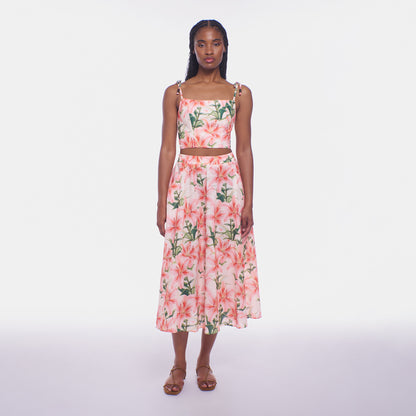 Woman wearing a floral dress on a white background